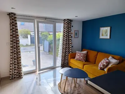 Coin salon dans l'établissement Bel appartement neuf proche Disneyland et Paris- A proximité de la gare de Meaux