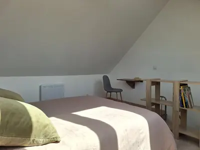 Un ou plusieurs lits dans un hébergement de l'établissement Bel appartement neuf proche Disneyland et Paris- A proximité de la gare de Meaux