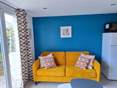 Coin salon dans l'établissement Bel appartement neuf proche Disneyland et Paris- A proximité de la gare de Meaux