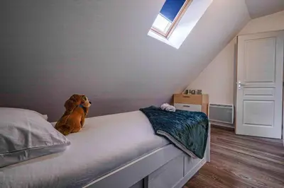 Un ou plusieurs lits dans un hébergement de l'établissement Magnifique maison de ville - parking - proche Disney