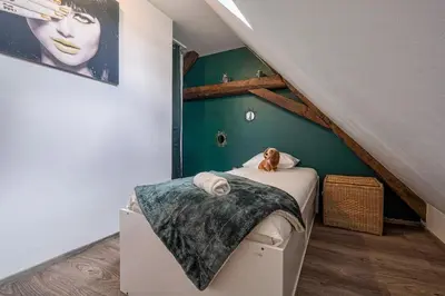 Un ou plusieurs lits dans un hébergement de l'établissement Magnifique maison de ville - parking - proche Disney