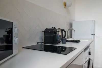 Cuisine ou kitchenette dans l'établissement Cocon douillet et lumineux dans le coeur historique