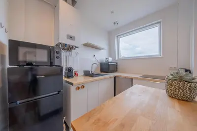 Cuisine ou kitchenette dans l'établissement Sommet Remois Cathedrale