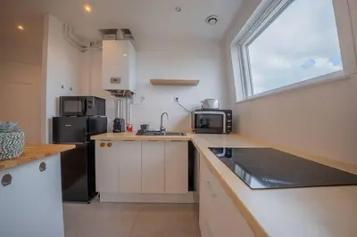 Cuisine ou kitchenette dans l'établissement Sommet Remois Cathedrale