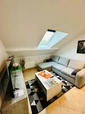 Coin salon dans l'établissement Le Rousseau
