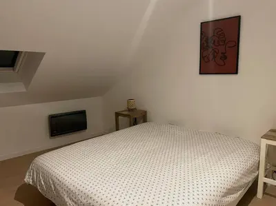 Télévision ou salle de divertissement dans l'établissement Bel appartement 2 chambres
