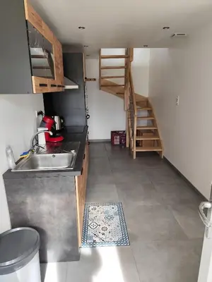 Cuisine ou kitchenette dans l'établissement Appartement 6 personnes au calme à 25minutes de disney
