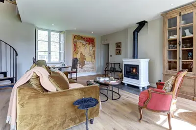 Coin salon dans l'établissement La petite châtelaine - Charmante maison au calme