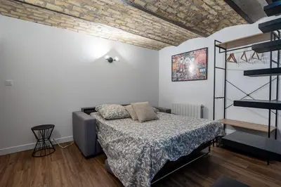 Un ou plusieurs lits dans un hébergement de l'établissement News ! Loft Movie Station Champagne