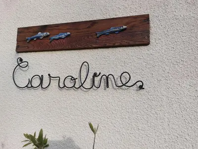 Certificat, récompense, panneau ou autre document affiché dans l'établissement maison caroline bairon