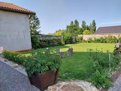 Jardin de l'établissement Agréable chambre pour 2 avec salle de bain et terrasse privées