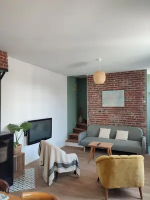 Coin salon dans l'établissement La maison des voyageurs avec grand parking privé -calme et sérénité