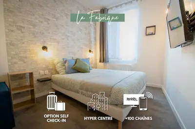 Un ou plusieurs lits dans un hébergement de l'établissement Chateau Compiegne Houses - Centre Ville