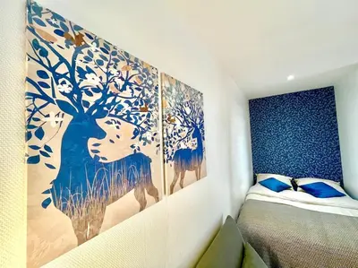 Un ou plusieurs lits dans un hébergement de l'établissement Splendide Cocon Sauna & Balnéo
