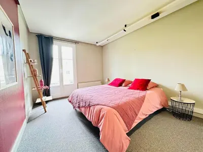 Un ou plusieurs lits dans un hébergement de l'établissement Duplex Laon'Tre-Deux