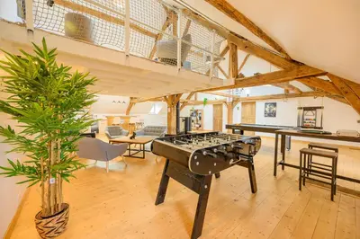 Coin salon dans l'établissement Gîte des dix potiers
