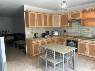 Cuisine ou kitchenette dans l'établissement La Maison des vendangeurs