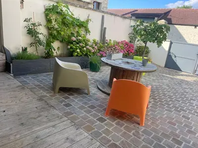 Terrasse ou espace extérieur de l'établissement Au cœur des Vignes