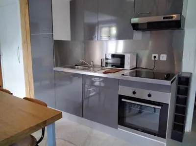 Cuisine ou kitchenette dans l'établissement Gîte LE LOFT chez Judith et Neiges