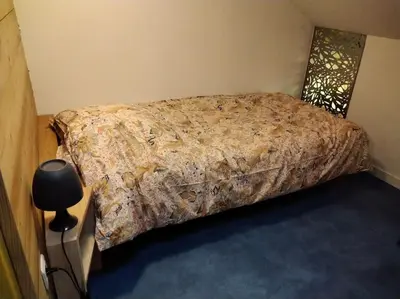 Un ou plusieurs lits dans un hébergement de l'établissement Gîte LE LOFT chez Judith et Neiges