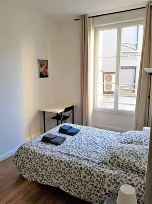 Un ou plusieurs lits dans un hébergement de l'établissement Le Cours Langlet C