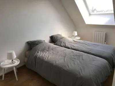 Un ou plusieurs lits dans un hébergement de l'établissement Le duplex de Talleyrand Hyper Centre