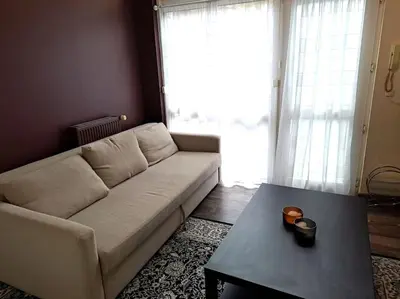 Coin salon dans l'établissement Suite Chanzy 69