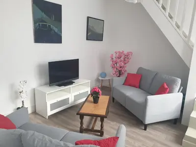 Télévision ou salle de divertissement dans l'établissement Gardenia