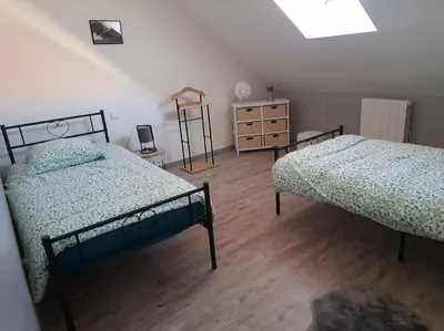 Un ou plusieurs lits dans un hébergement de l'établissement la porte du Champagne