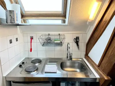 Cuisine ou kitchenette dans l'établissement Studette Vesle 3