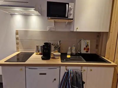 Cuisine ou kitchenette dans l'établissement Appartement des Charmilles, Compiègne hyper-centre