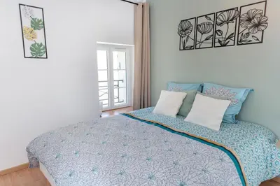 Un ou plusieurs lits dans un hébergement de l'établissement Maison avec grand jardin, la Celle-sur-Morin