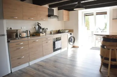 Cuisine ou kitchenette dans l'établissement Gite la Tann'yére