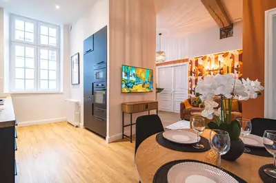 Télévision ou salle de divertissement dans l'établissement MM Suites Loft Cathédrale