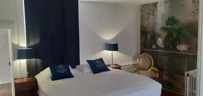 Un ou plusieurs lits dans un hébergement de l'établissement LA SUITE de NOTRE DAME au pied du CHATEAU FORT