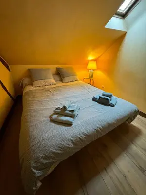 Un ou plusieurs lits dans un hébergement de l'établissement Duplex atypique dans la cité médiévale