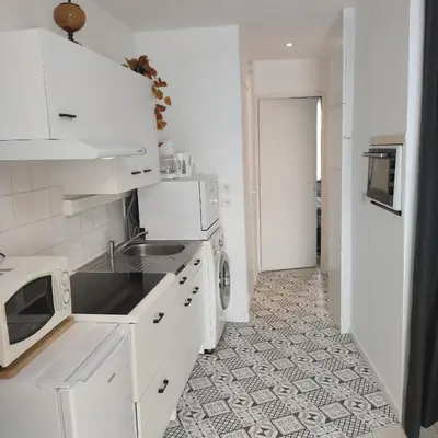 Cuisine ou kitchenette dans l'établissement Dans le Centre historique