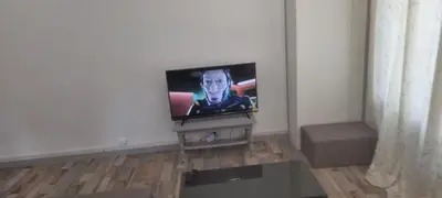 Télévision ou salle de divertissement dans l'établissement Le Nid de Trosly - grand, confortable et calme