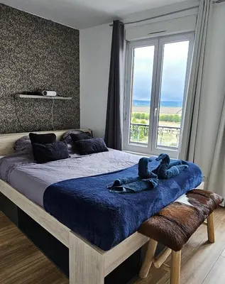 Un ou plusieurs lits dans un hébergement de l'établissement Beautiful appartement with perfect location