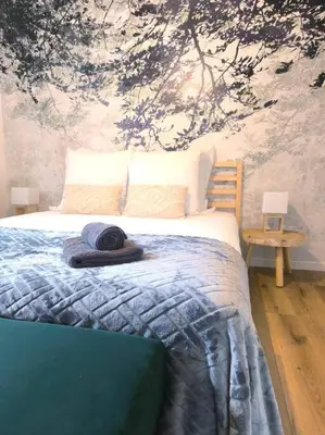 Un ou plusieurs lits dans un hébergement de l'établissement NOUVEAU Les Grumes 2 - Maison - 2 chambres - Jardin - Neuf