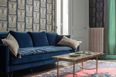 Coin salon dans l'établissement Appartement vintage - Reims centre