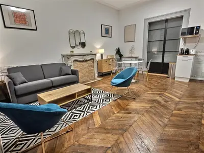 Coin salon dans l'établissement Superbe, T2 Spacieux 50m², Hypercentre, Neuf, RDC