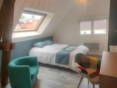 Un ou plusieurs lits dans un hébergement de l'établissement Longère Cosy parking privé cuisine
