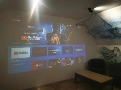 Télévision ou salle de divertissement dans l'établissement Gîte de L'océan