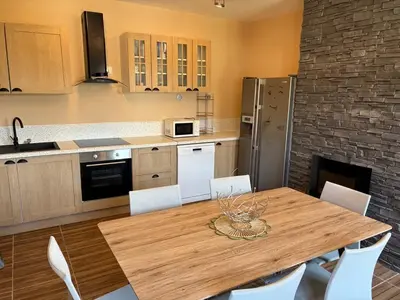 Cuisine ou kitchenette dans l'établissement Gîte de L'océan