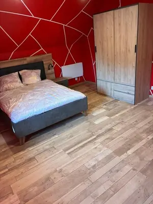 Un ou plusieurs lits dans un hébergement de l'établissement Gîte de L'océan