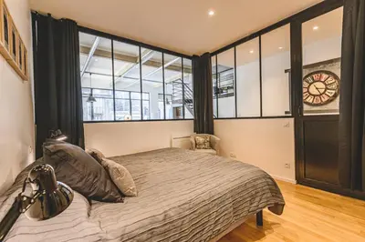 Un ou plusieurs lits dans un hébergement de l'établissement IKIZEN Prestige - Loft du Cadran - parking privé