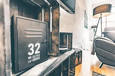 Télévision ou salle de divertissement dans l'établissement IKIZEN Prestige - Loft du Cadran - parking privé
