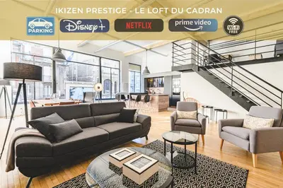 Coin salon dans l'établissement IKIZEN Prestige - Loft du Cadran - parking privé