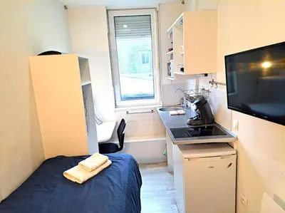 Cuisine ou kitchenette dans l'établissement Studette Vesle 4